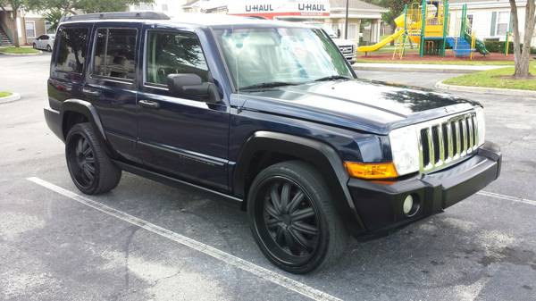 06 JEEP COMMANDER. 22 RIMS AND TIRES, SUROOF, COLD AC. TOW WITH V8.