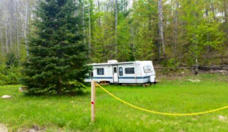 12 acre in Frederic mi with 2 campers trade for