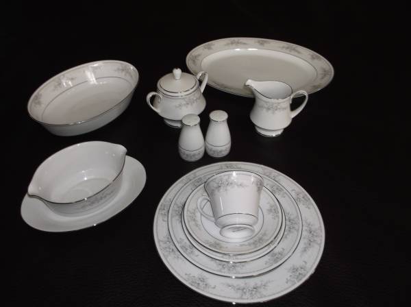 12 place setting plus serving Noritake Formal almost new wOrth 900