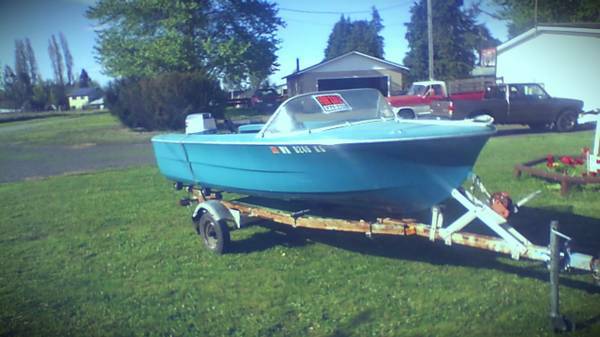 14 Rinell, 25 hp evinrude trailer