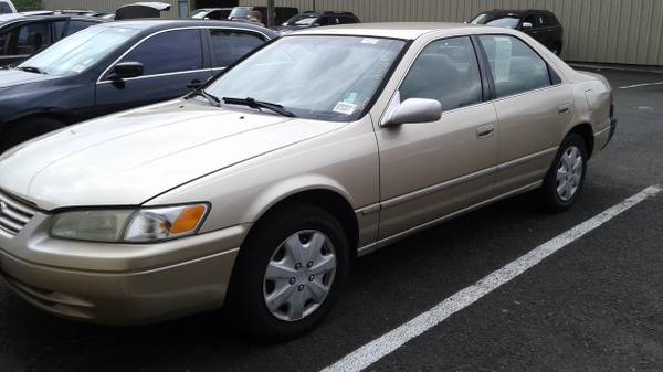 1997 Toyota camry runs drives good .  Good tags all power oprions 4cyl