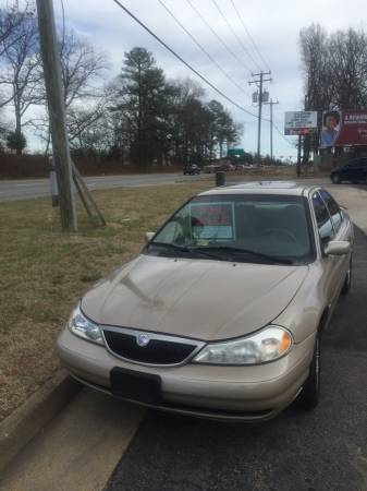 1999 Mercury mystique 150K in excellent condition everything works reliable tran