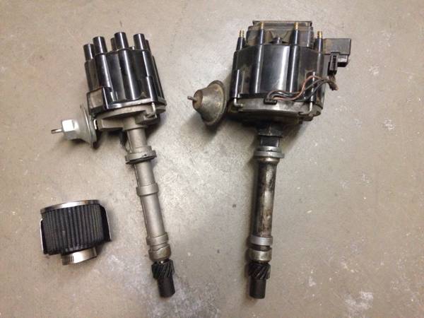 2 Chevy small block distributors, 1 points, 1 HEI