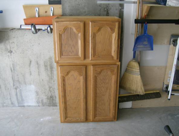2 Oak cabinets