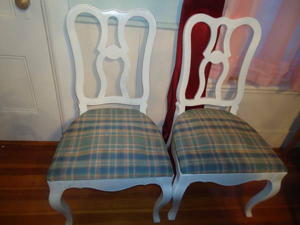 2 white side chairs