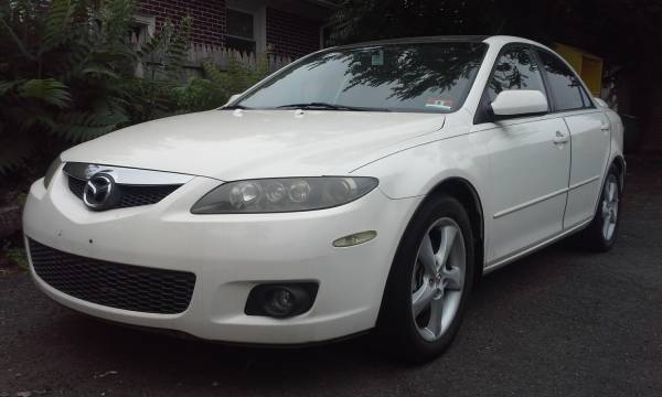 2006 MAZDA 6.. Very low miles only 68k..