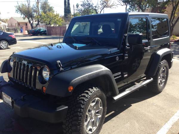 2011 Jeep Wrangler sport under blue book value w low miles and well maintained