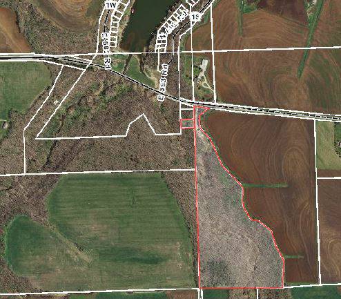 25 acres with building, water, sewer, amp electric (Lone Star Lake)