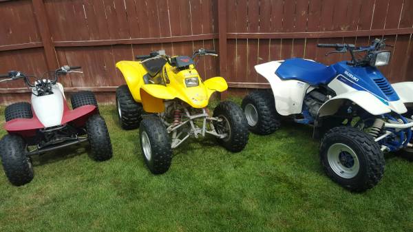 3 ATVs 2 Hondas and 1 Suzuki