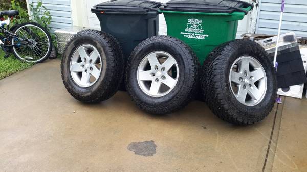 3 rims and tires from Jeep Rubicon