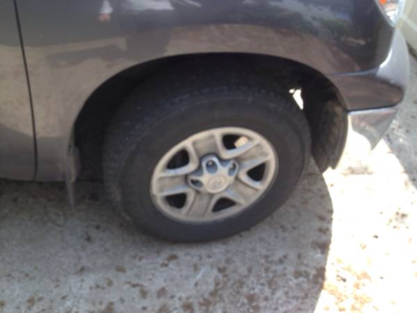 4 newer tires and Wheels Rims Toyota Tundra