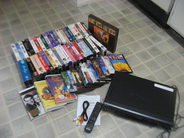 44 VHS Movies, 11 DVD Movies and Sony VHS PlayerRecorder