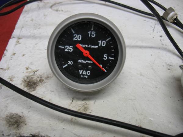 6 Auto Meter Gauges