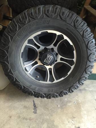 8 lug Rockstar Xd wheels and cooper tires