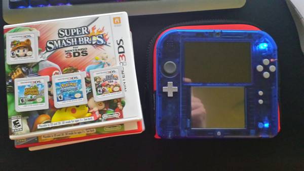 Almost New 2DS with 4 Awesome Games