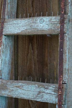 Antique rustic industrial wooden ladder