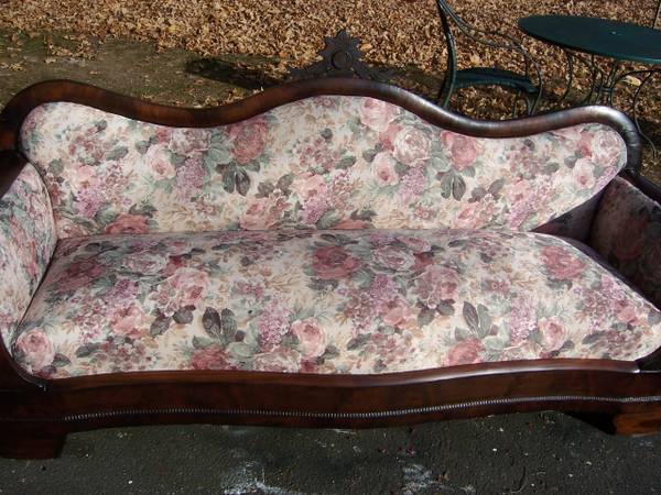Beautiful antique mahogany sofa and armchair with foot stool