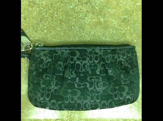 Black and silver COACH wristlet. Like new 40 OBO