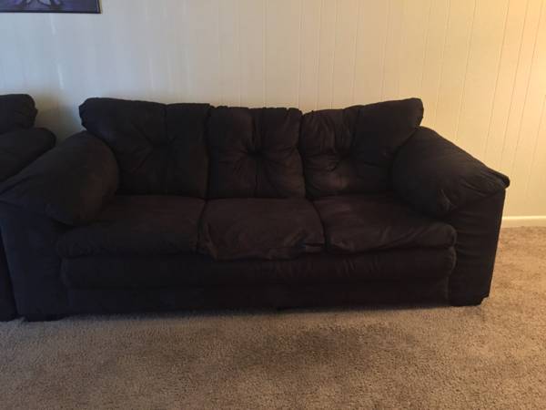 Black couch and love seat medium sized