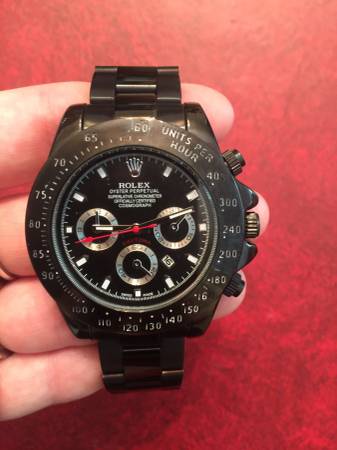 Black Rolex watch
