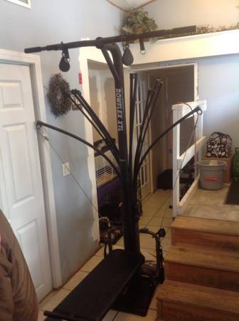 bowflex XTL with lat tower and leg attach.