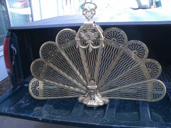 Brass fan style fireplace screen