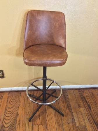 BROWN CUSHIONED CHAIR