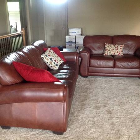 Brown leather sofa and loveseat