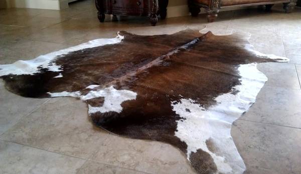 Cowhide Rugs on sale  cowhide pillows also available