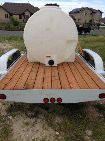 Dual Axle Flatbed Trailer and 300 Gallon Water Tank