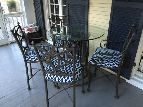 Glass top table with 4 chairs