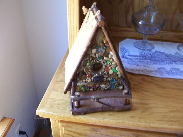 Handmade decorated birdhouse
