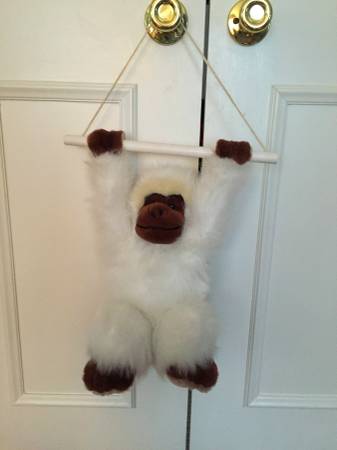 Hanging stuffed monkey