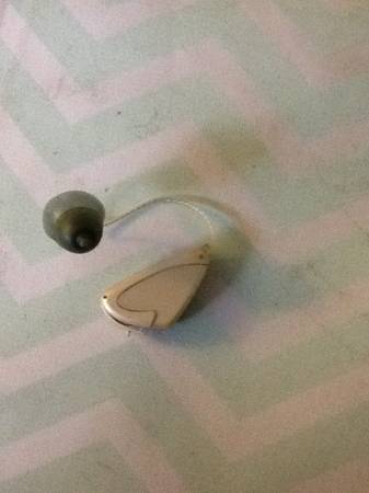 Hearing aid in white case (SE PDX)