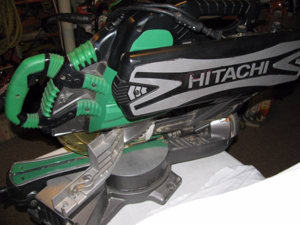 Hitachi 12 double bevel laser sliding miter like new with stand