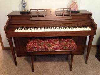 Hospe piano with bench seat
