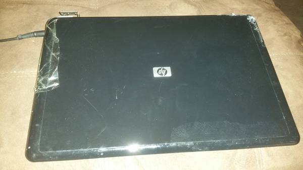 HP Laptop. Cosmetic damages but Working