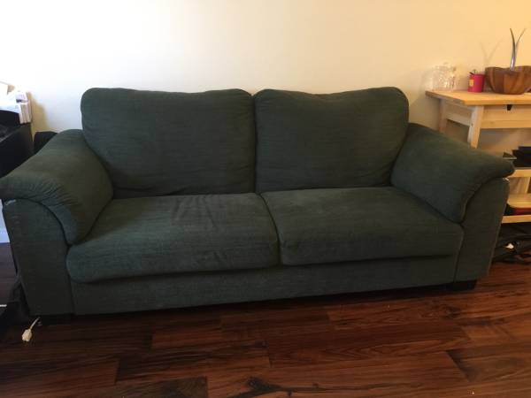 Large plush hunter green sofa