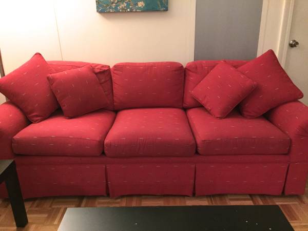 Large Three Person Couch with Four Matching Red Pillows For Sale