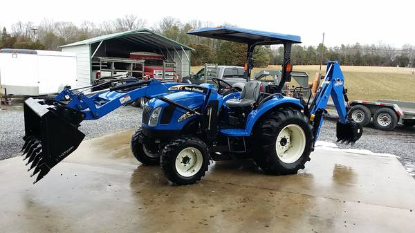 New Holland TC40 40hp diesel 4x4 backhoe tractor w forks only 40hrs (Free hauling to your home)