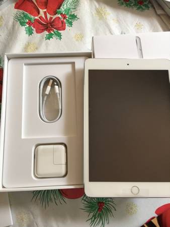 New in box iPad Mini 3 Silver