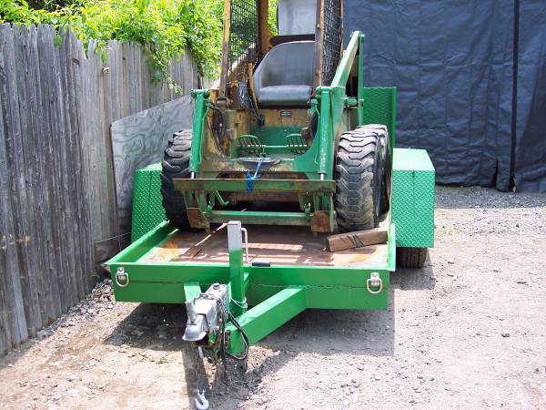 Older Bobcat and Trailer 700 series