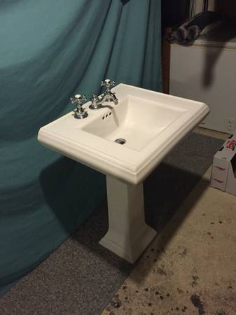 Pedestal sink with custom faucet