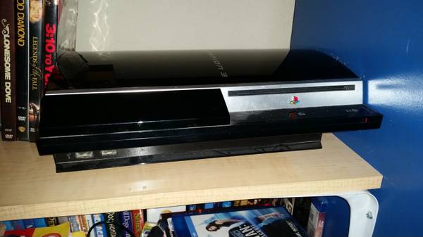PS3 74gb, 2 controllers, PS TV remote, and 4 games