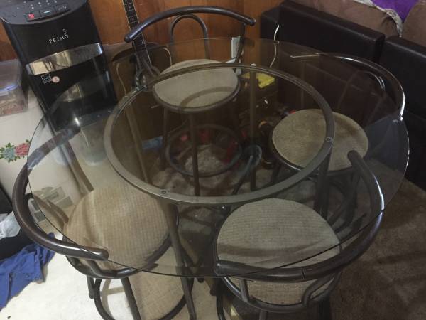 Round glass dining set with 4 chairs