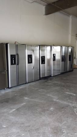 STAINLESS STEEL REFRIGERATORS (SIDE BY SIDE) (706 PROFIT DR. GARLAND, TX)