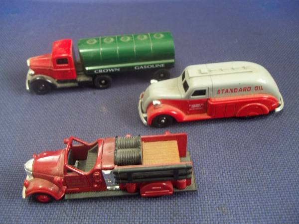Three small toy trucks  Vintage Style