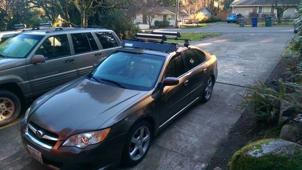 thule ski rack. universal fit for small or midsize car. (bothell)