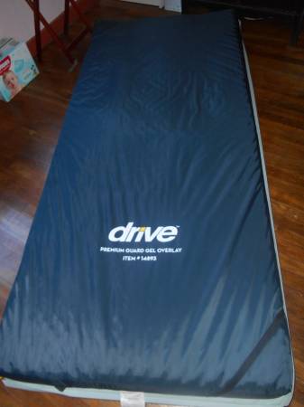 Twin mattress with memorty foam topper