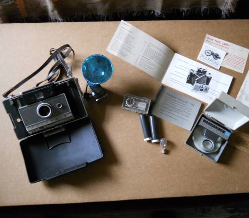 Vintage Polaroid 100 Land Camera and slide tray